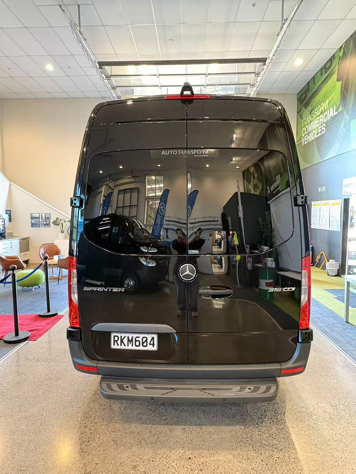 NZNT 2026 black Mercedes-Benz Sprinter 12-seater rear view